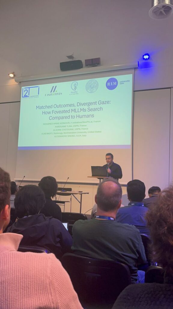 A speaker presents the award-winning work at the ECCV Human Inspired Computer Vision workshop.